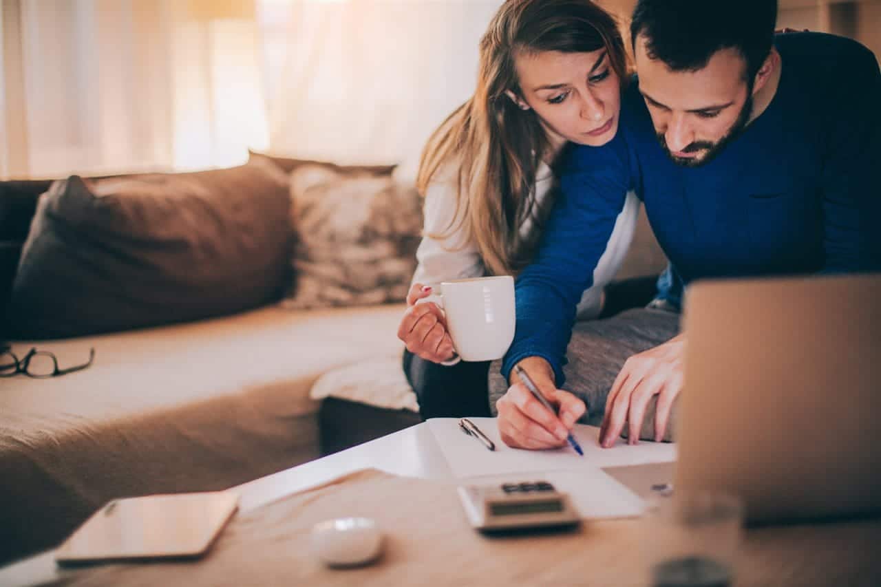 a couple working on papers | Be Informed Home Inspections | buy a home Dallas a couple working on papers | Be Informed Home Inspections | buy a home Dallas