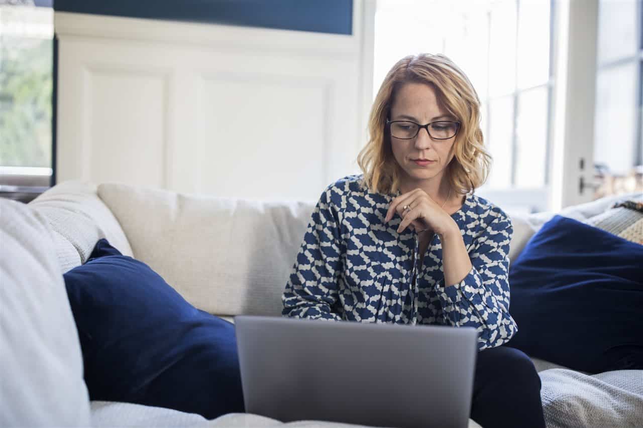 woman looking at her laptop | Be Informed Inspections | Dallas Home Inspection | protecting your digital house from cybercrime woman looking at her laptop | Be Informed Inspections | Dallas Home Inspection | protecting your digital house from cybercrime