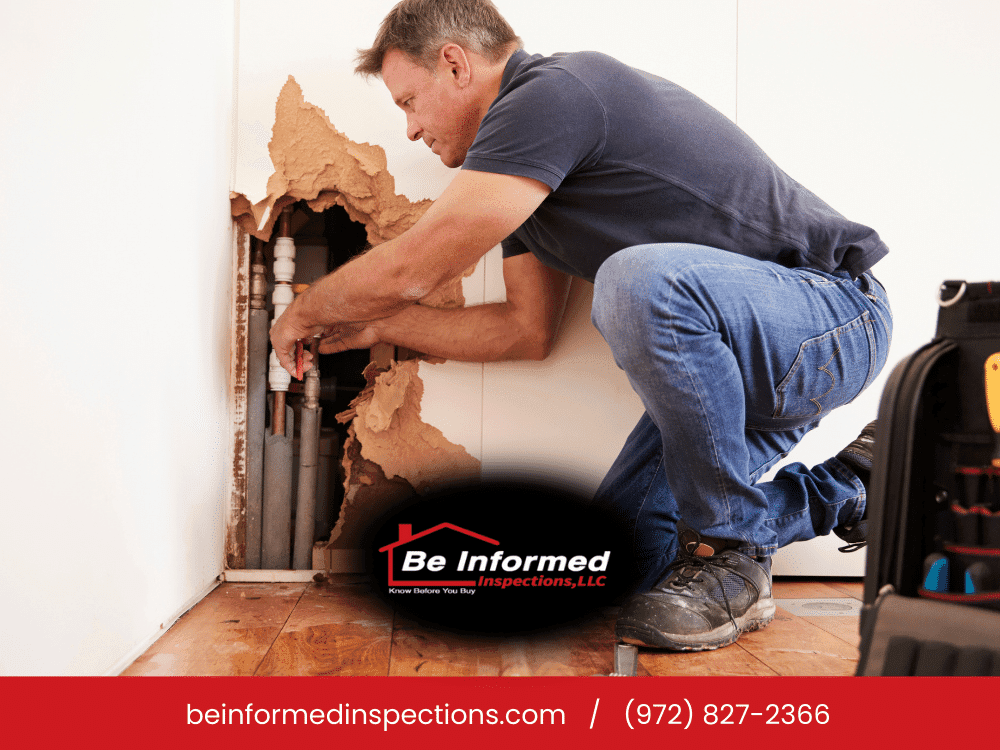 Plumbing Leak Inspection in Dallas Fort Worth Home Home inspector evaluating exposed plumbing pipes behind damaged drywall during home inspection in Dallas Fort Worth TX
