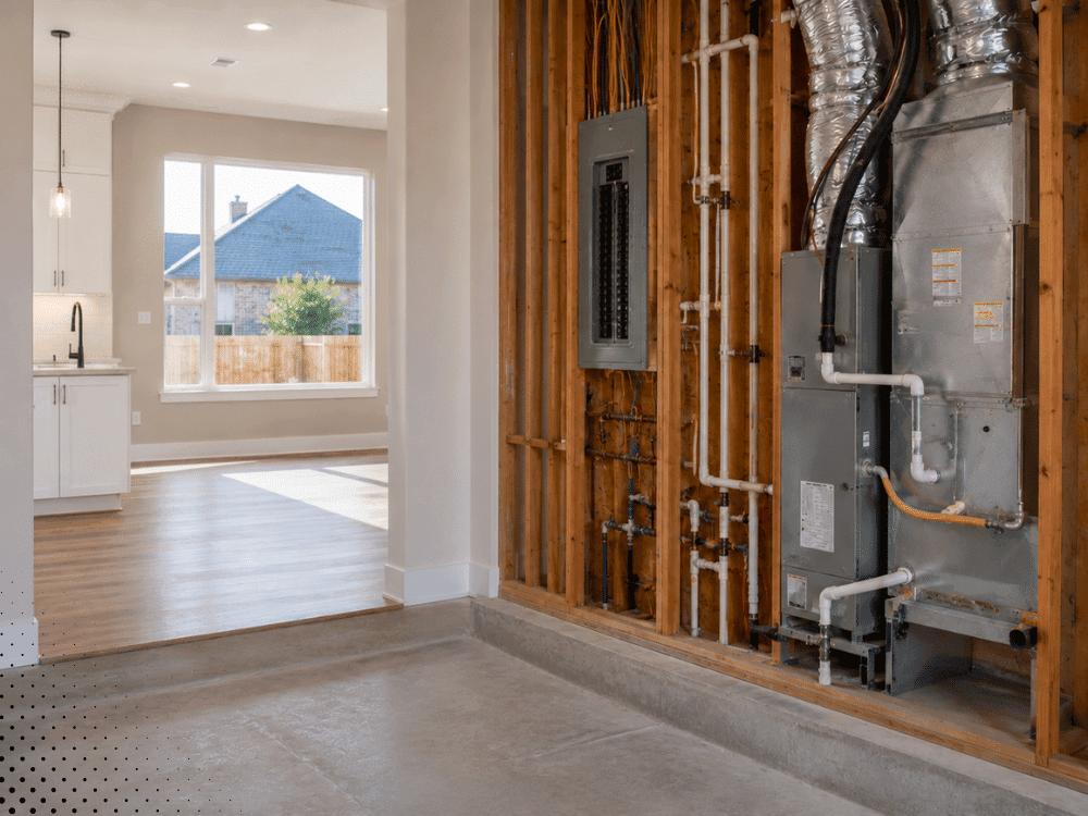 Home inspector checking electrical and plumbing systems in a new construction home in Little Elm, TX